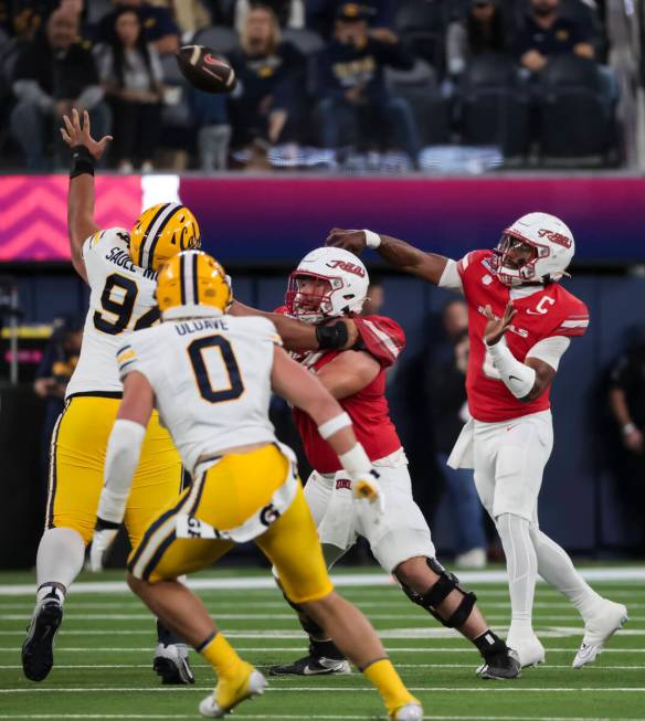 UNLV quarterback Hajj-Malik Williams (6) throws a pass during the first half of the LA Bowl NCA ...