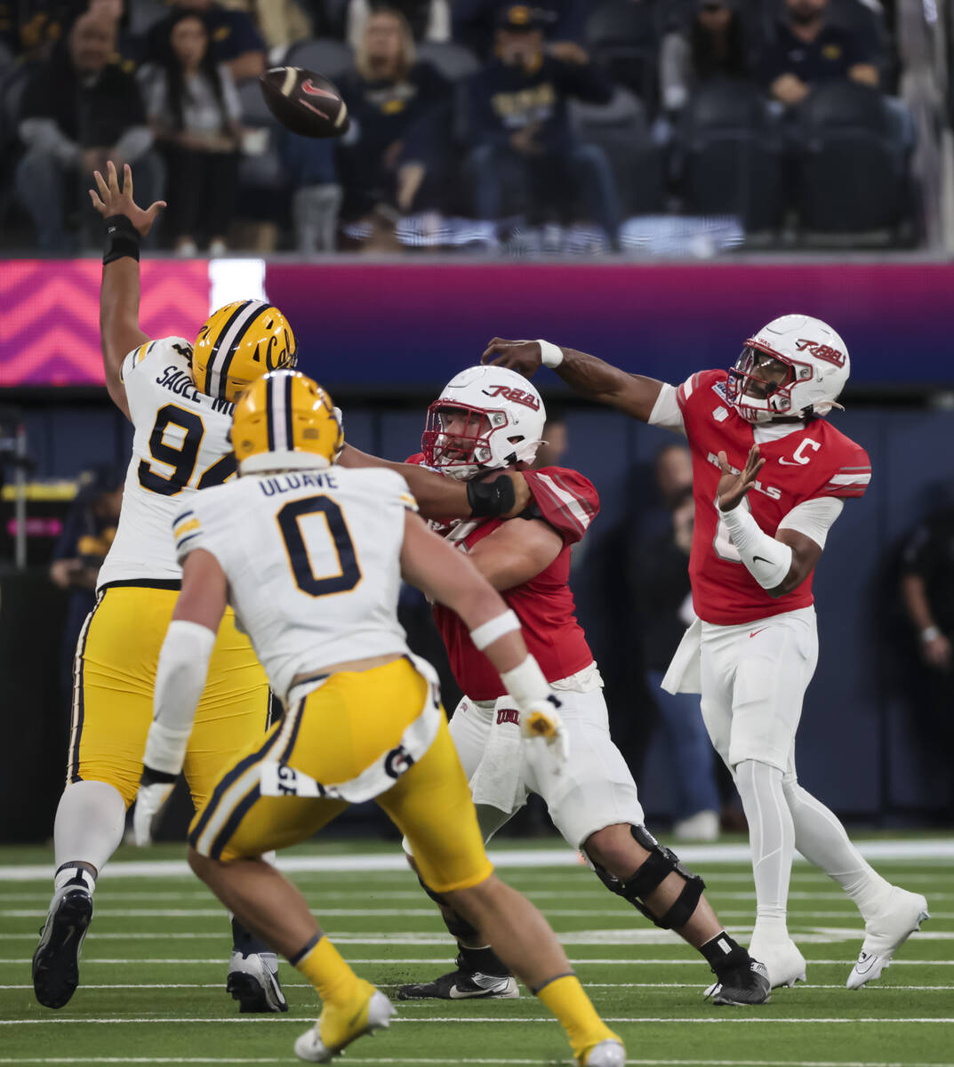 UNLV quarterback Hajj-Malik Williams (6) throws a pass during the first half of the LA Bowl NCA ...