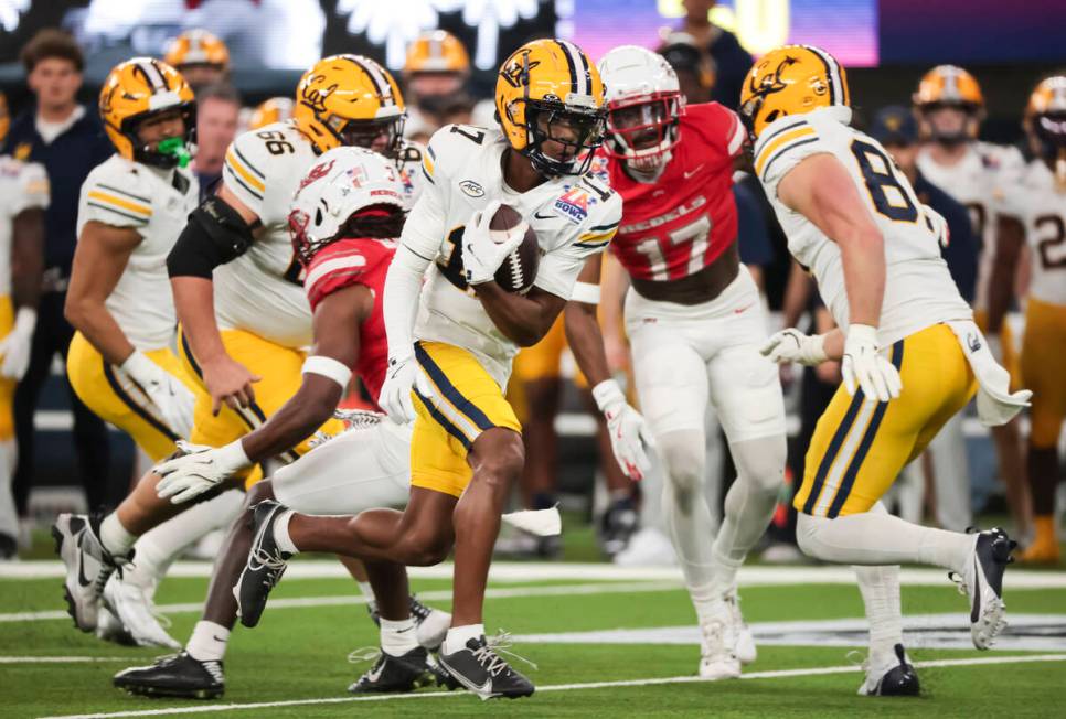 Cal wide receiver Josiah Martin (17) gets past UNLV defense to score a touchdown during the fir ...