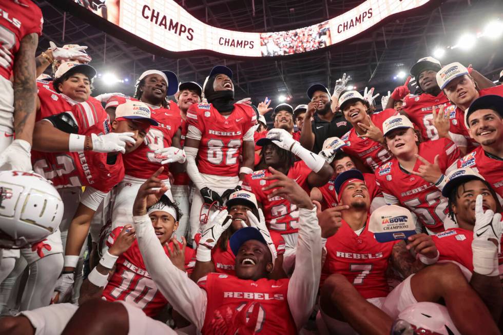 UNLV players celebrate after defeating Cal in the LA Bowl NCAA college football game at SoFi St ...