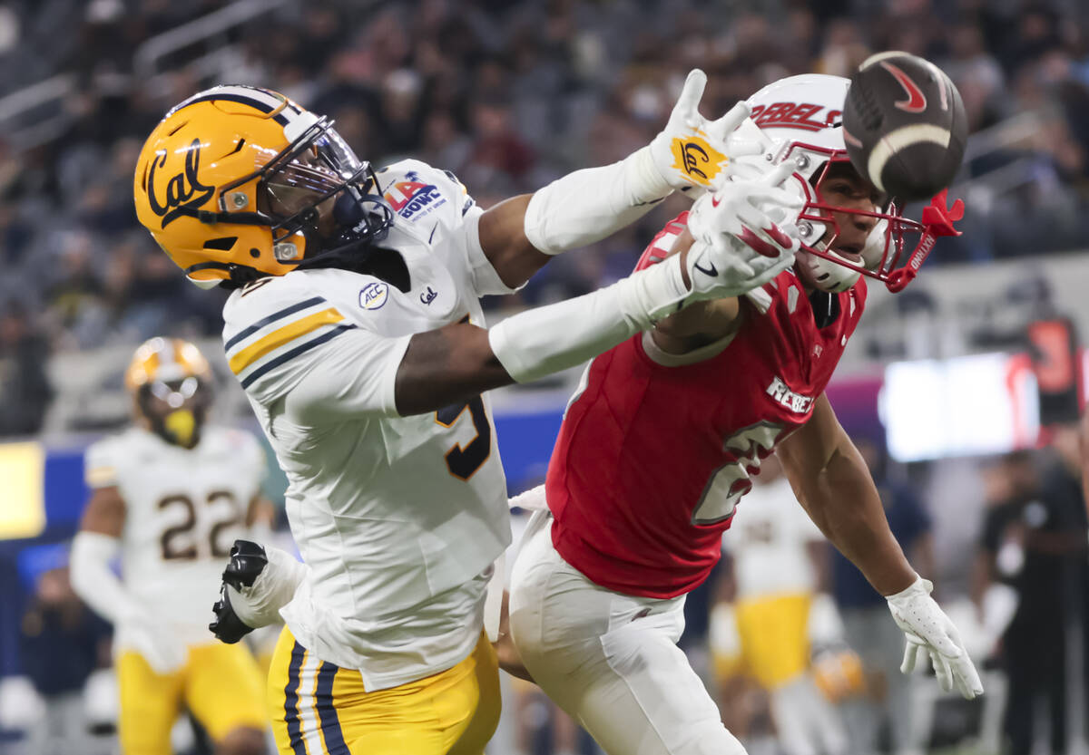 Cal defensive back Ryan Yaites (9) breaks up a pass intended for UNLV wide receiver Jacob De Je ...