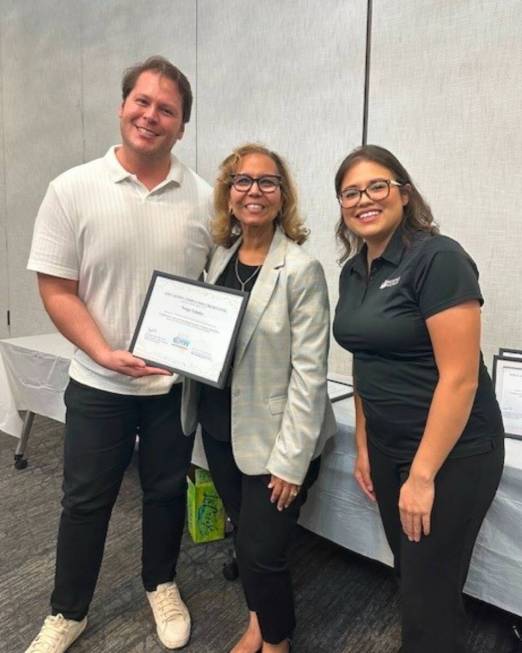 Luis Aceves, bilingual community health worker instructor, Nolga Valadez, a graduate of the pro ...