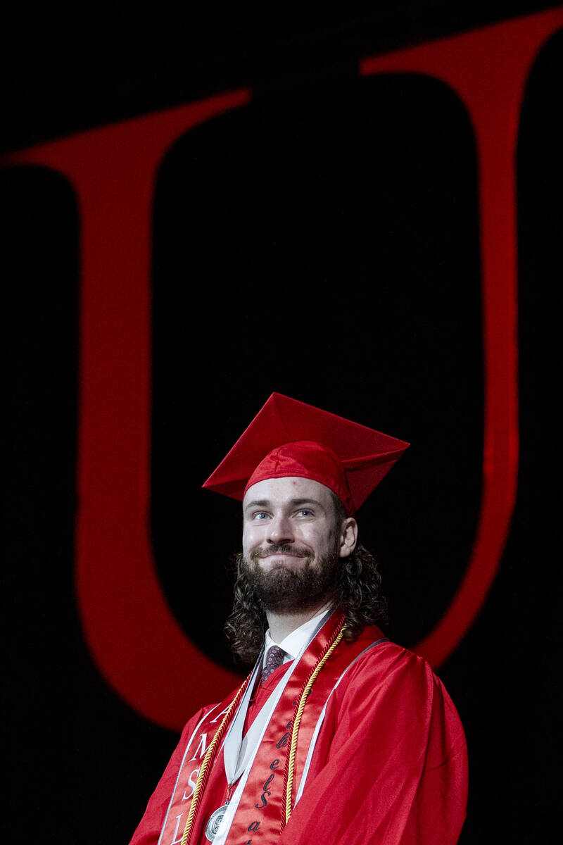 Outstanding Graduate Daniel Fisher is introduced during the UNLV winter commencement at the Tho ...