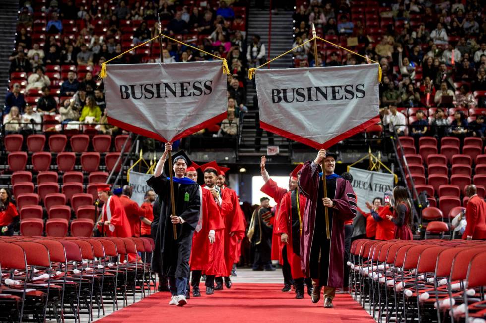 UNLV School of Business graduates are introduced during the UNLV winter commencement at the Tho ...