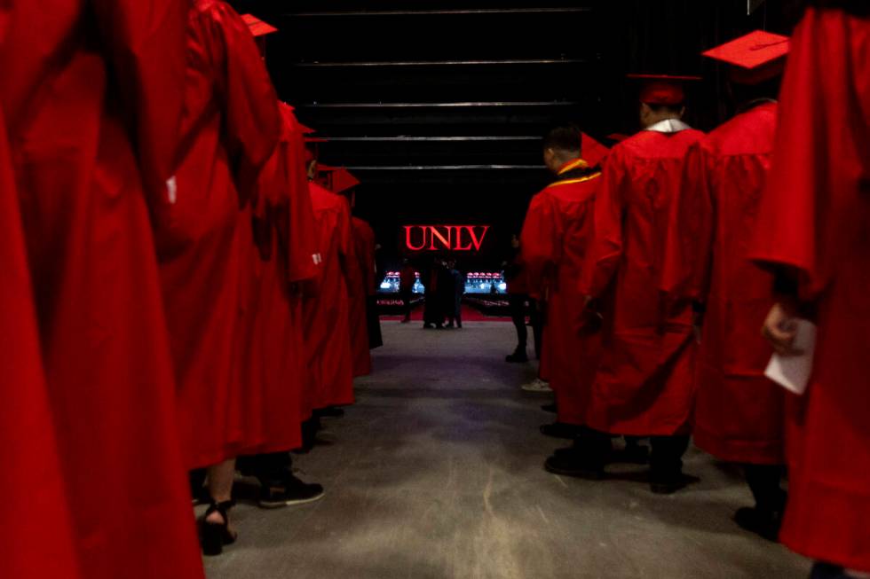 Graduates wait to enter the floor before the UNLV winter commencement at the Thomas & Mack ...