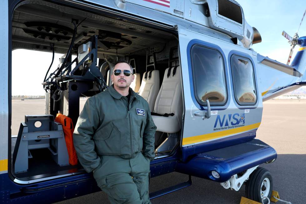 Pilot and Aviation Department Manager Mike Toland talks to a reporter about a new U.S. Departme ...