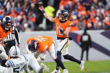 Denver Broncos quarterback Bo Nix (10) in the second half of an NFL football game Sunday, Dec. ...