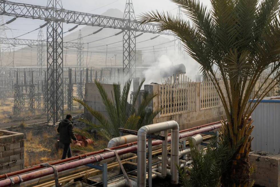 Smoke rises from the scene of an Israeli airstrike on the Haziz power station in southern Sanaa ...