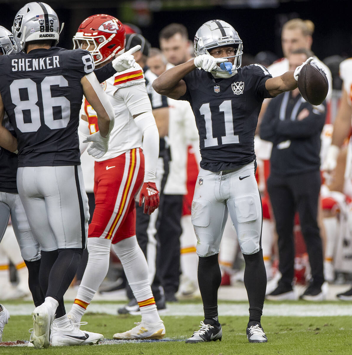 Raiders wide receiver Tre Tucker (11) celebrates making a first down during the first half of t ...