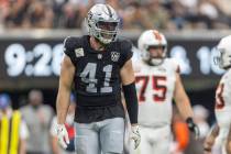 Raiders linebacker Robert Spillane (41) smiles on the field during the first half of an NFL gam ...