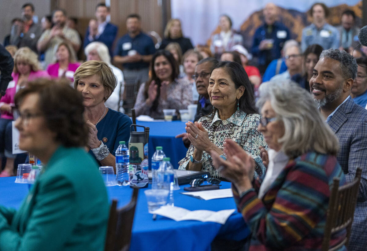 Interior Secretary Deb Haaland, right center, applauds as she joins other leaders, Nevada triba ...