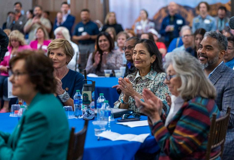 Interior Secretary Deb Haaland, right center, applauds as she joins other leaders, Nevada triba ...