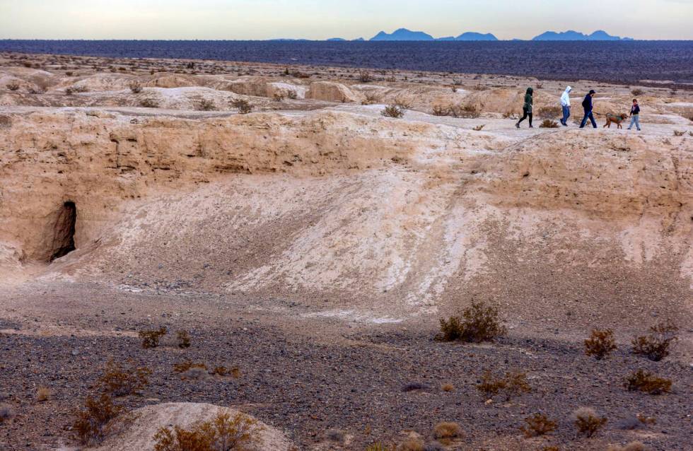 People walk about the Tule Springs Fossil Beds National Monument which is one of the locations ...