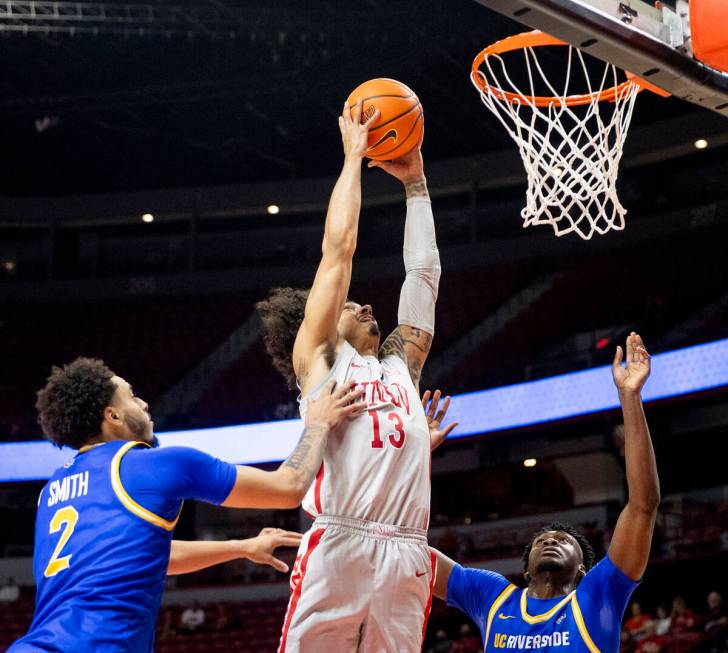 UNLV guard Brooklyn Hicks (13) attempts to dunk the ball during the second half of the college ...