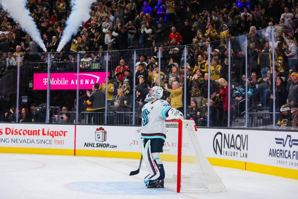 Seattle Kraken goaltender Philipp Grubauer (31) watches Golden Knights fans celebrate another g ...