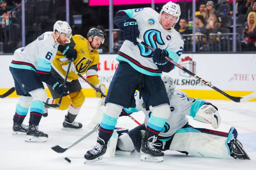 Seattle Kraken defenseman Vince Dunn (29) watches the puck escape him during an NHL hockey game ...