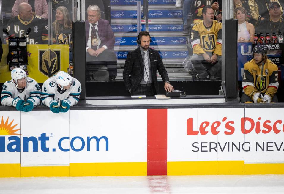 Color commentator Shane Hnidy reports between the team benches during the third period of the N ...