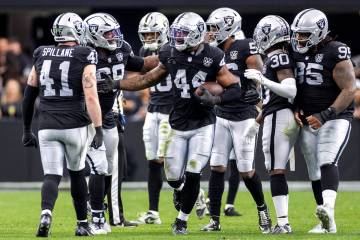 Raiders defensive end K'Lavon Chaisson (44) celebrates with his teammates after a play during t ...