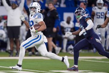 Indianapolis Colts running back Jonathan Taylor (28) runs for a touchdown during the first half ...