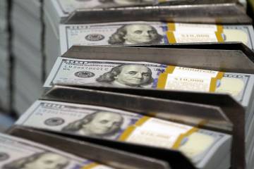 $100 bills are seen in this file photo. (AP Photo/LM Otero)