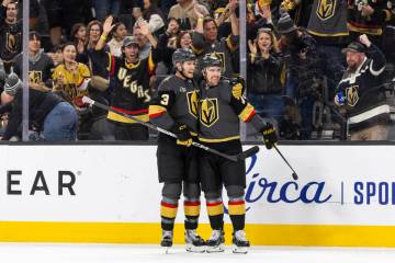 Golden Knights defenseman Brayden McNabb (3) and left wing Tanner Pearson, right, celebrate aft ...