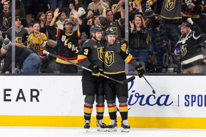 Golden Knights defenseman Brayden McNabb (3) and left wing Tanner Pearson, right, celebrate aft ...