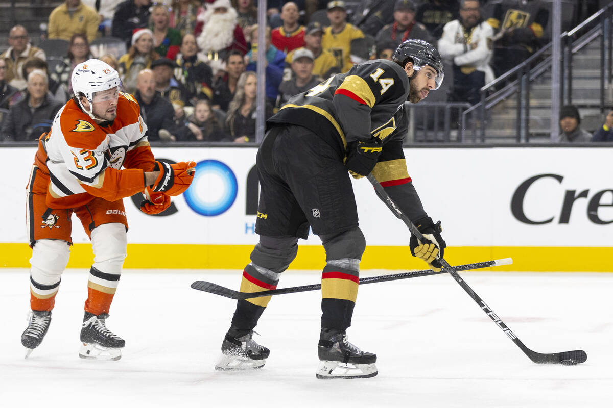 Anaheim Ducks center Mason McTavish (23) loses his stick between the legs of Golden Knights def ...