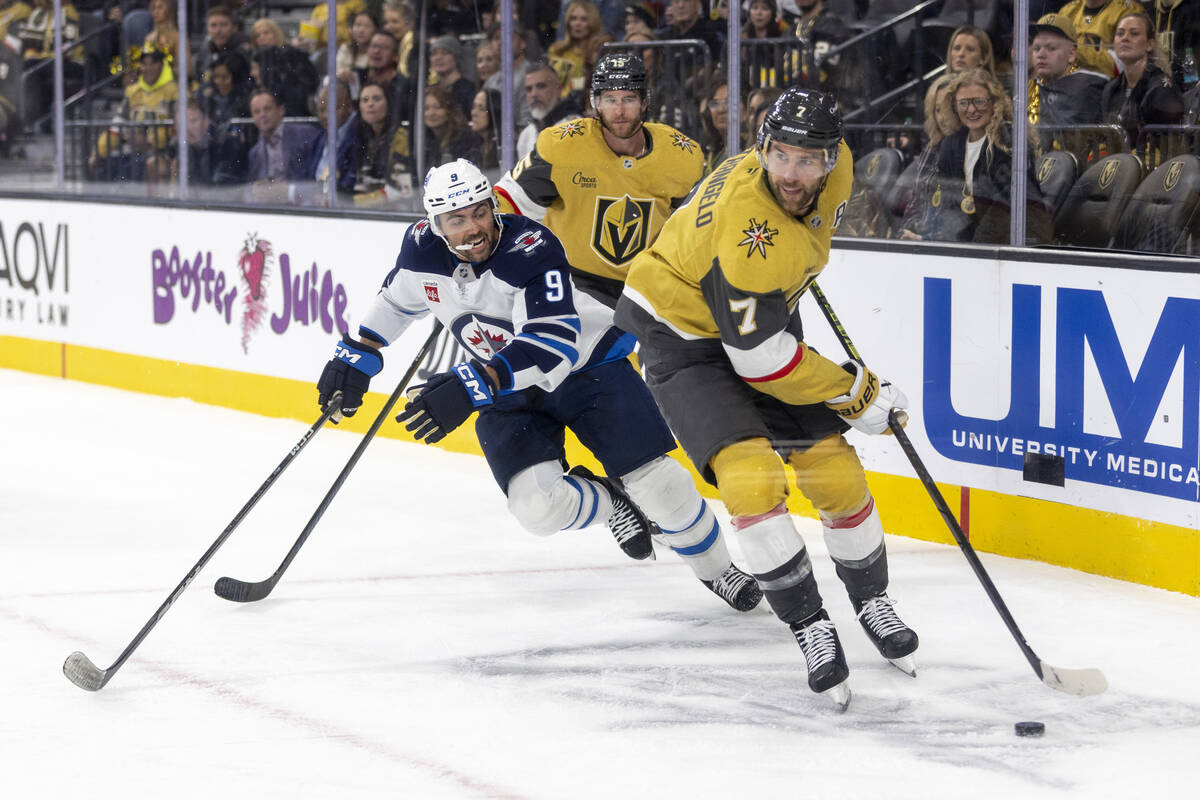 Golden Knights defenseman Alex Pietrangelo (7) takes the puck around the net during the second ...