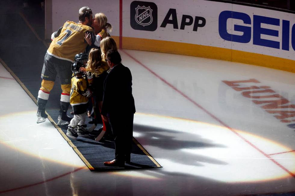 Vegas Golden Knights defenseman Alex Pietrangelo (7) kisses his wife, Jayne, during a ceremony ...