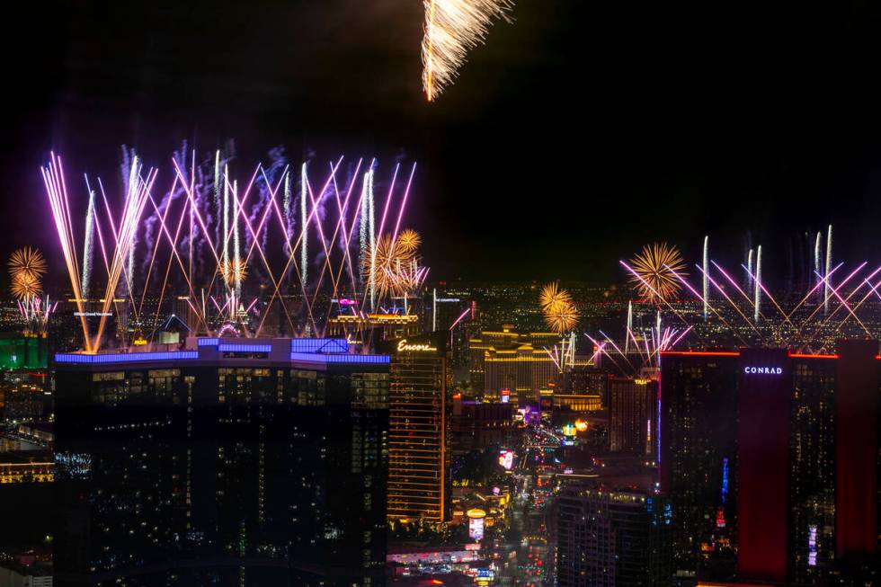 Fireworks erupt over the Las Vegas Strip as part of New Years Eve festivities across the city f ...