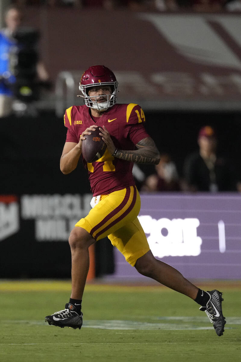 Southern California quarterback Jayden Maiava gets set to pass during the second half of an NCA ...