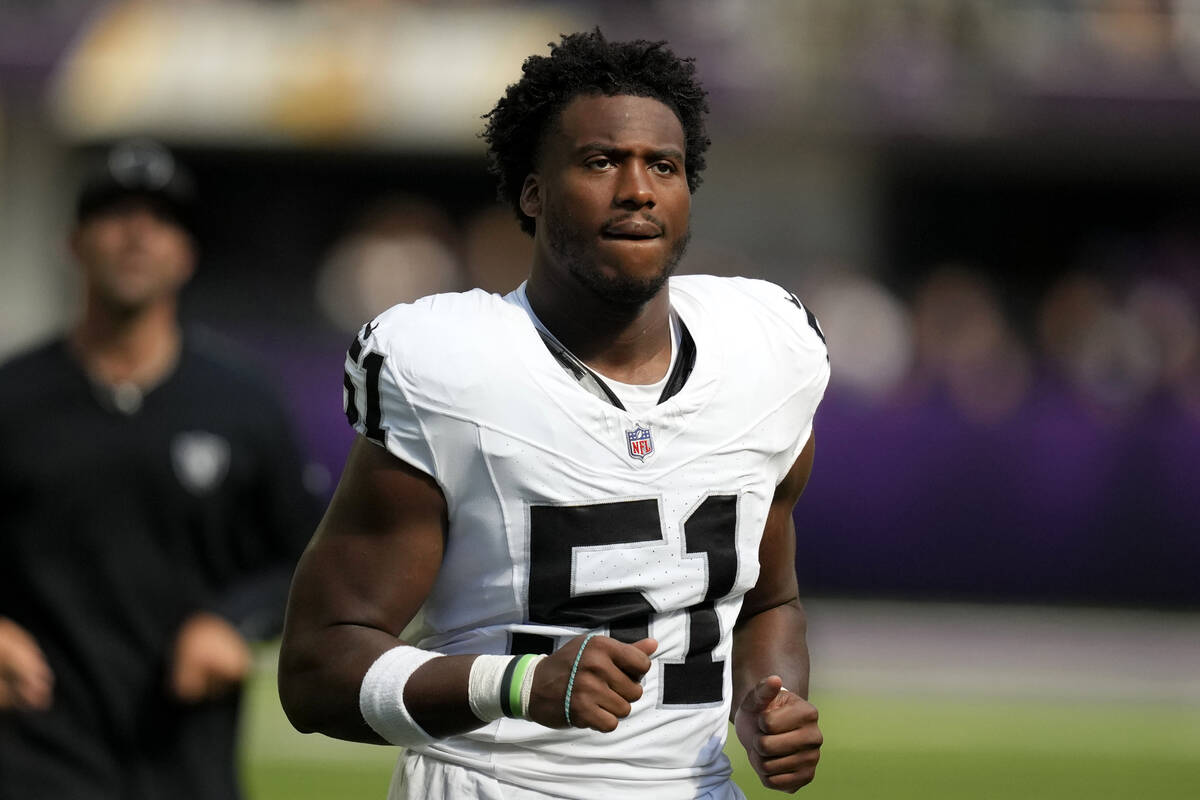 Las Vegas Raiders defensive end Malcolm Koonce (51) runs off the field at halftime of an NFL pr ...