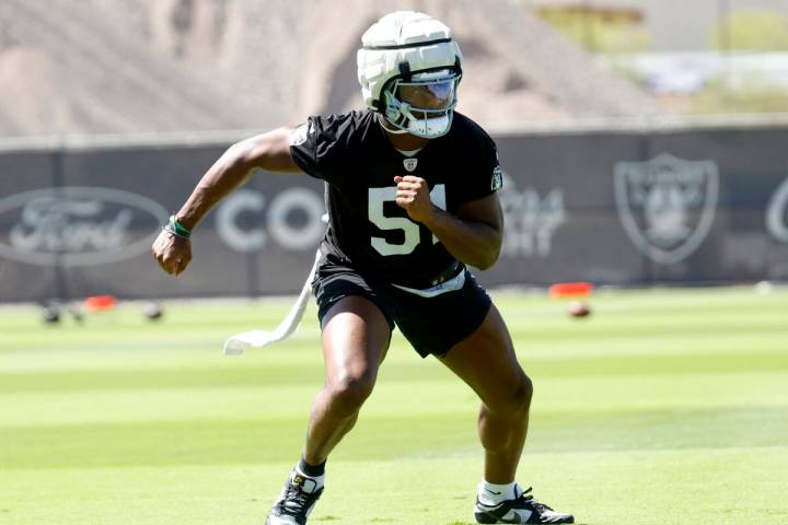 Raiders defensive end Malcolm Koonce runs through drills during organized team activities at th ...