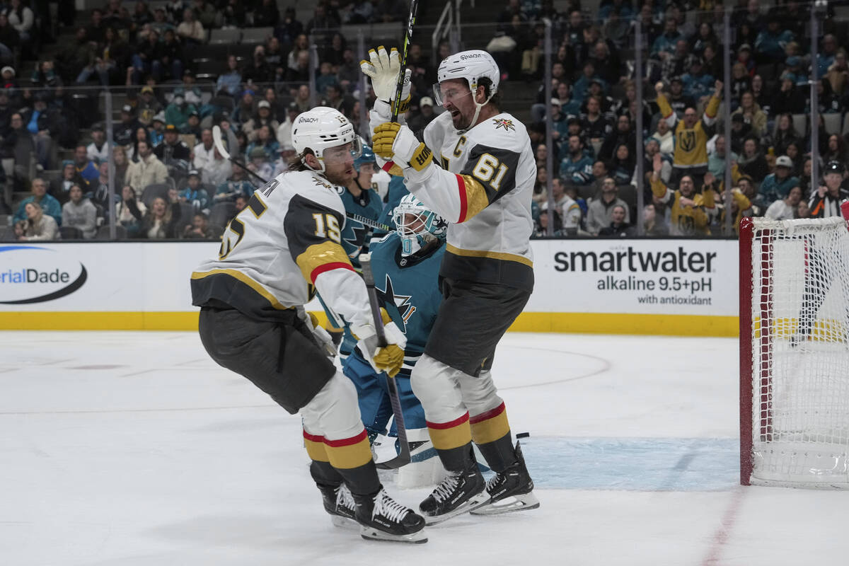 Vegas Golden Knights right wing Mark Stone (61) reacts after defenseman Noah Hanifin (15) score ...