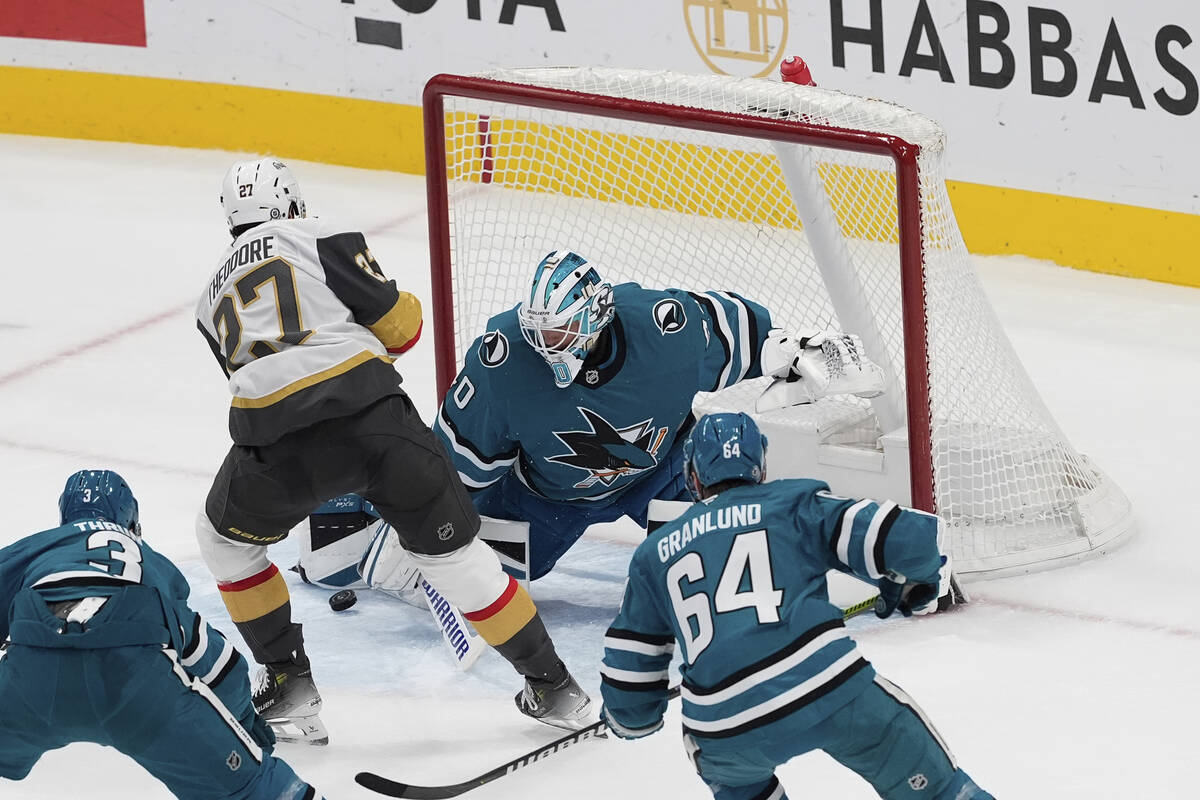 San Jose Sharks goaltender Alexandar Georgiev (40) blocks a shot by Vegas Golden Knights defens ...