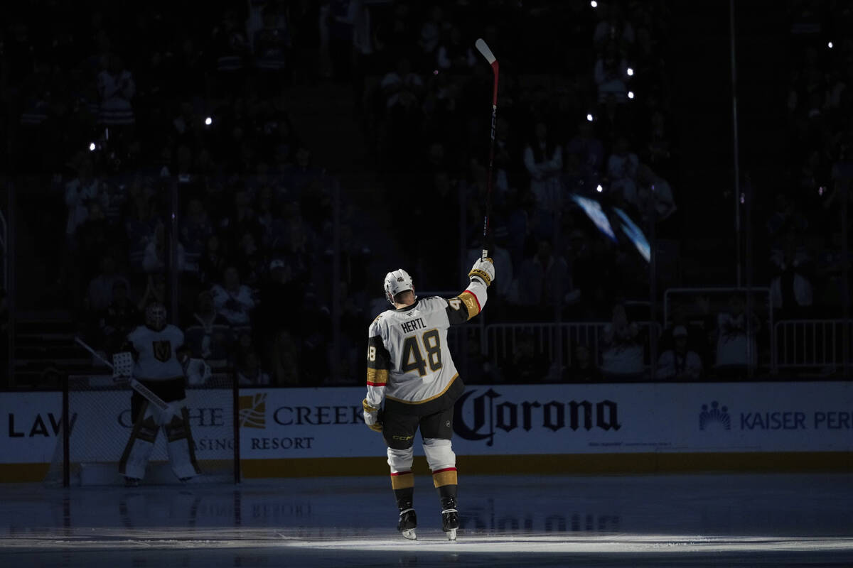 Vegas Golden Knights center Tomas Hertl gestures while being introduced before an NHL hockey ga ...