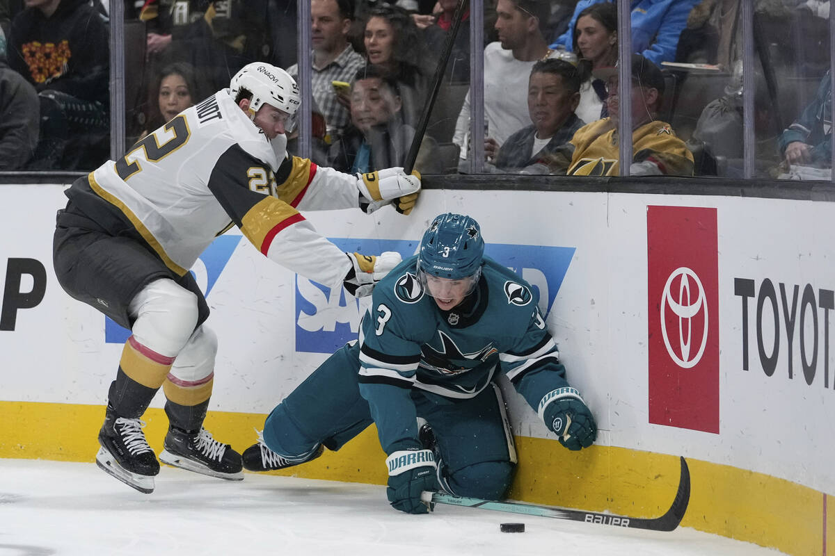 Vegas Golden Knights right wing Cole Schwindt, left, and San Jose Sharks defenseman Henry Thrun ...