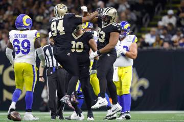 New Orleans Saints defensive end Cameron Jordan (94) celebrates after a play with defensive tac ...