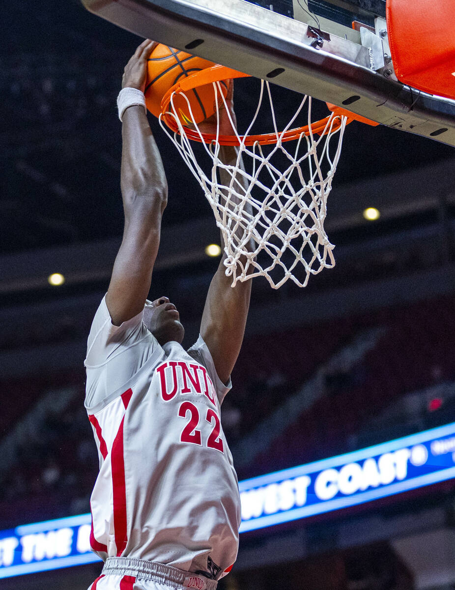 UNLV forward Pape N'Diaye (22) dunks the ball against the Fresno State Bulldogs during the seco ...