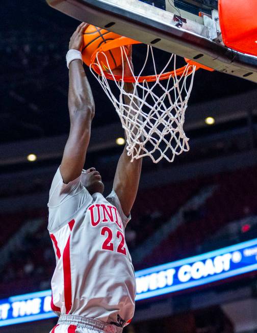 UNLV forward Pape N'Diaye (22) dunks the ball against the Fresno State Bulldogs during the seco ...