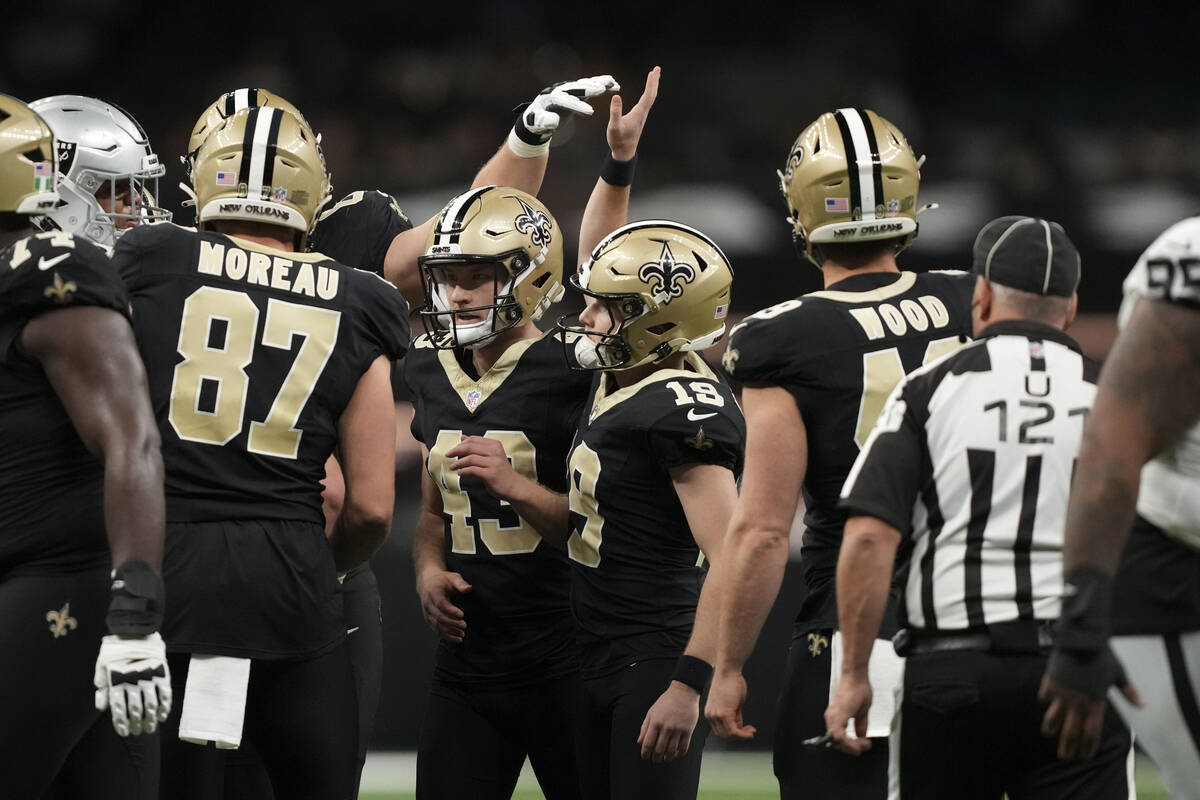 New Orleans Saints place kicker Blake Grupe celebrates with teammates after kicking a 34-yard f ...