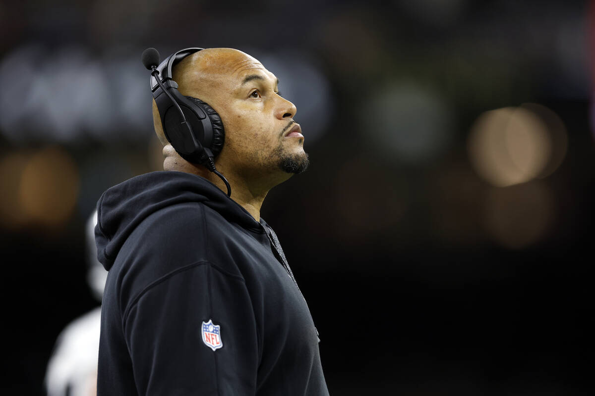 Las Vegas Raiders head coach Antonio Pierce reacts to a play during an NFL football game agains ...