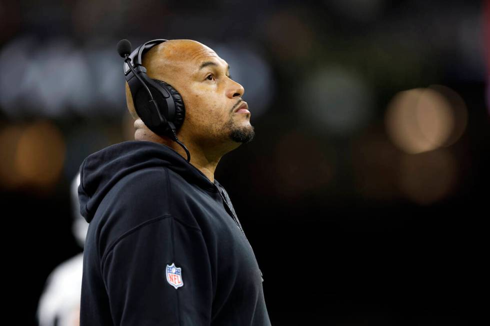 Las Vegas Raiders head coach Antonio Pierce reacts to a play during an NFL football game agains ...