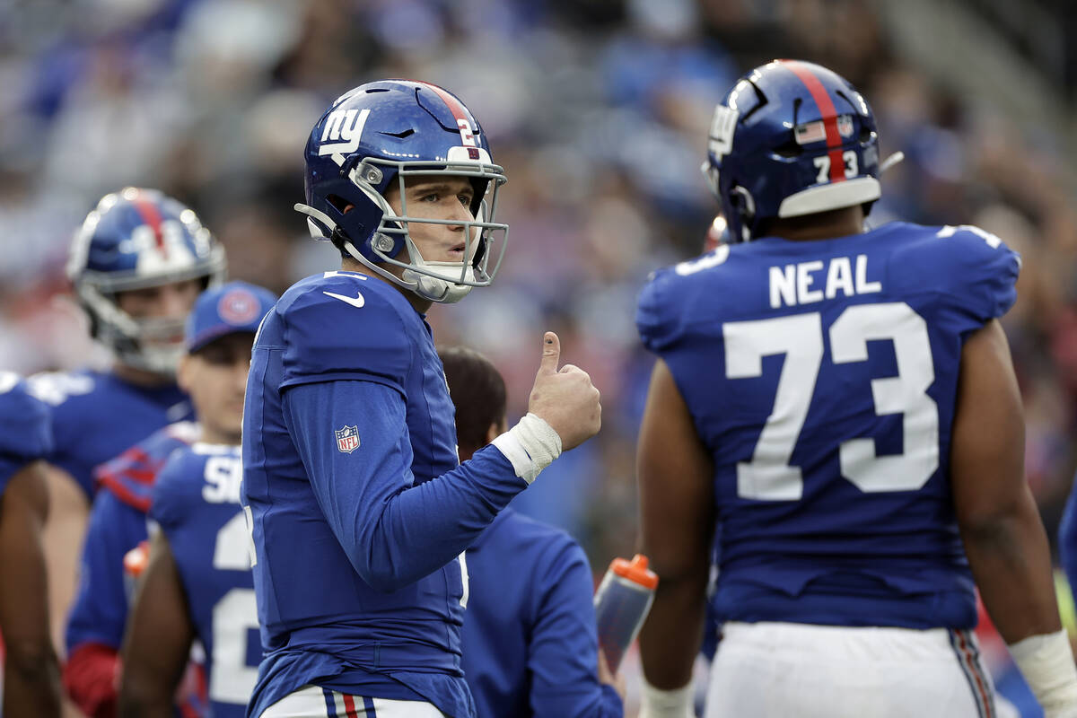 New York Giants quarterback Drew Lock (2) reacts during an NFL football game against the Indian ...