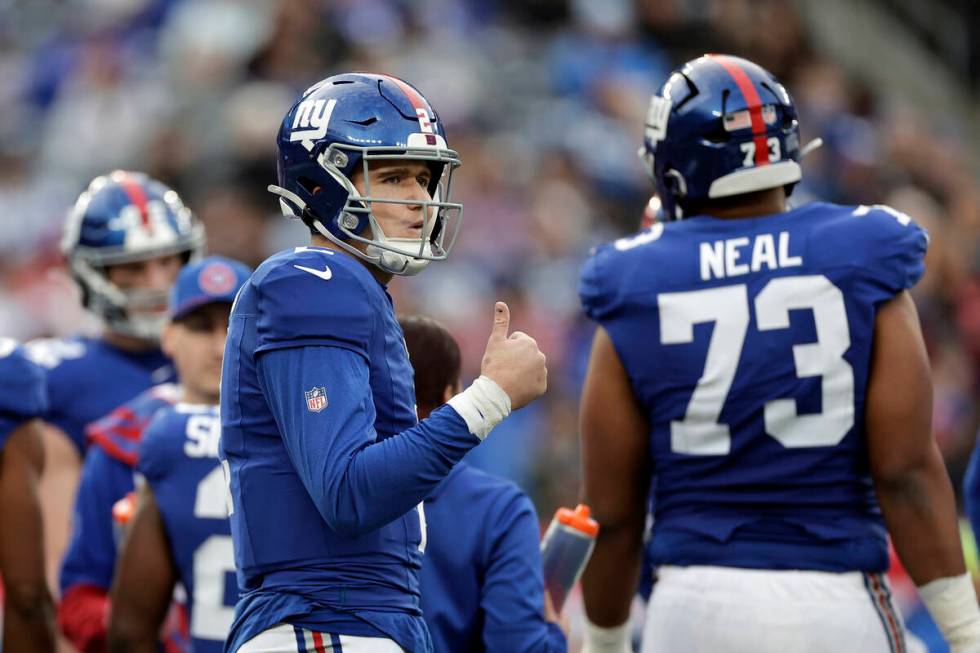 New York Giants quarterback Drew Lock (2) reacts during an NFL football game against the Indian ...