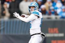 Detroit Lions quarterback Jared Goff (16) looks to pass the ball during the second half of an N ...