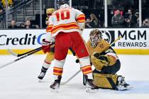 Calgary Flames center Jonathan Huberdeau (10) shoots against Vegas Golden Knights goaltender Il ...