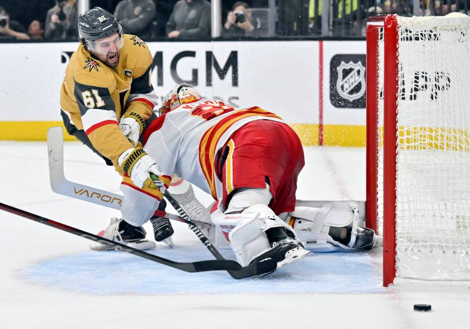 Vegas Golden Knights right wing Mark Stone (61) shoots against Calgary Flames goaltender Dan Vl ...