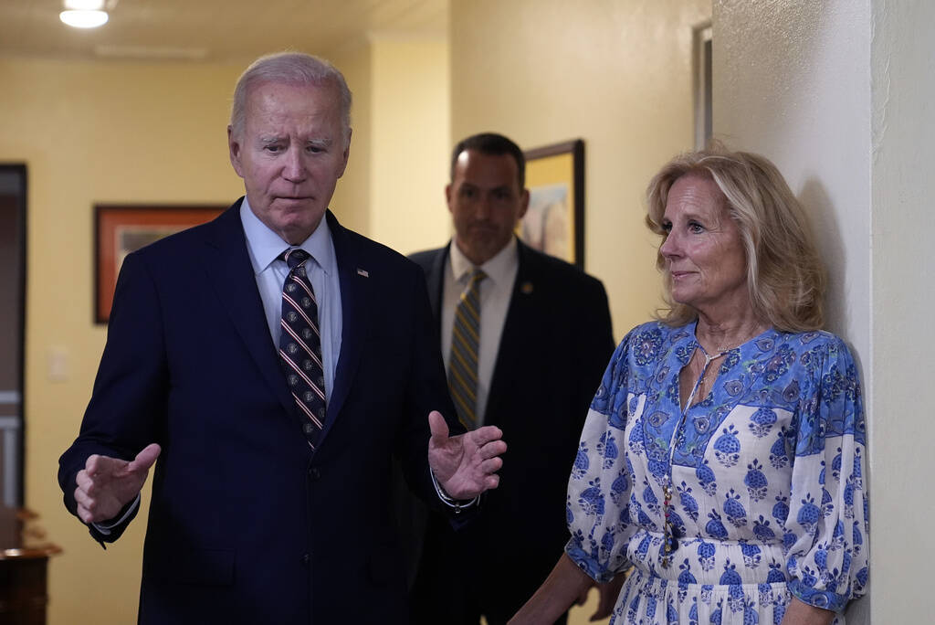 President Joe Biden arrives with first lady Jill Biden to speak about the death of former Presi ...