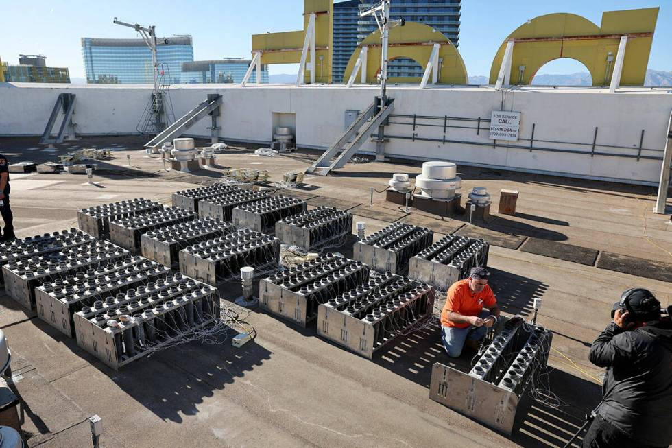 Fireworks by Grucci pyro technician and crew chief Louis DeLeo prepares shells while setting up ...